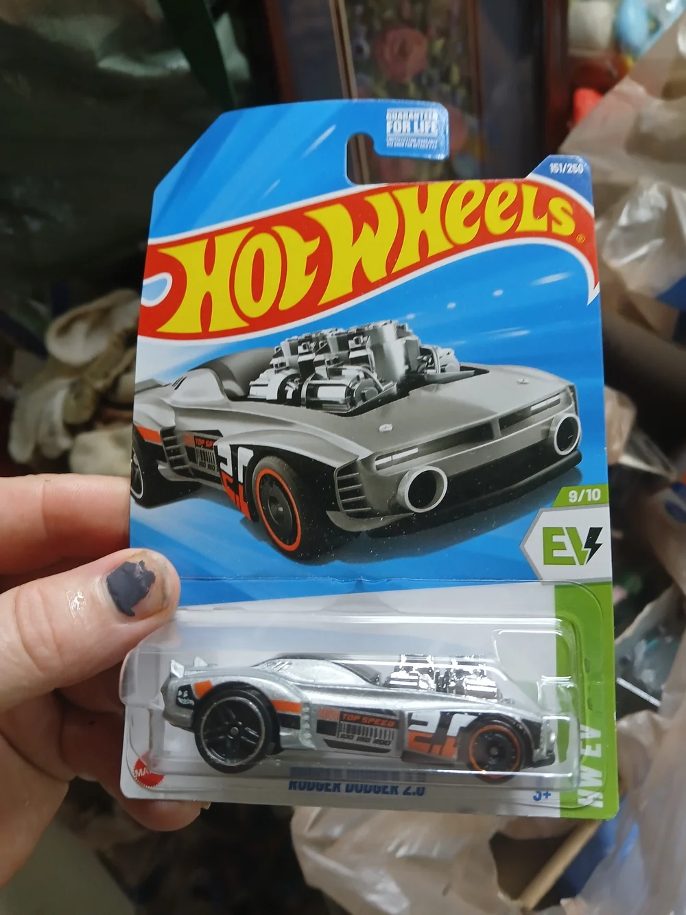 the Hot Wheels Rodger Dodger 2.0 (ebay.com) in grey from the 2025 HW EV series (